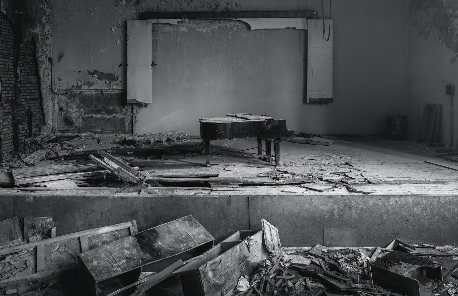 grayscale photo of wooden bench